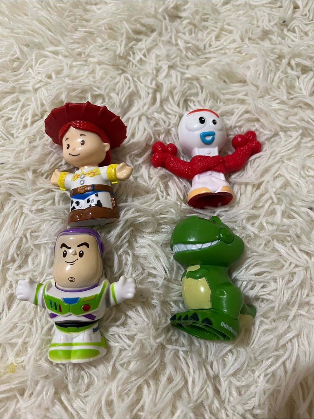 Little P Toy Story Character Buzz Jessie, spoony, and dinosaur